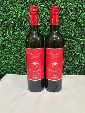 Two EMPTY wine bottles